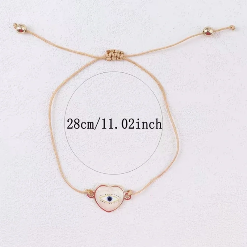 Gold and Pearlized Heart Evil Eye Adjustable Rope Bracelet - Picture 3 of 3